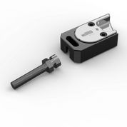IZI Brothers axle blocks for Sur-Ron Light Bee swingarm - raw black top view of single piece exterior side disassembled
